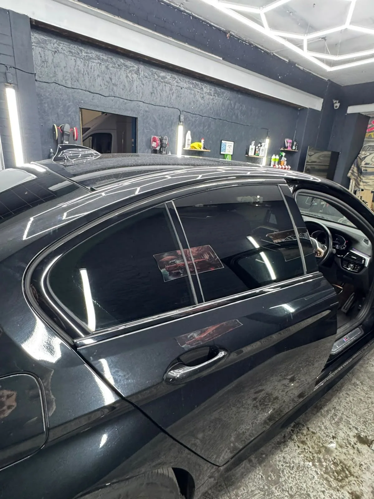 Dark hatchback with tinted rear windows